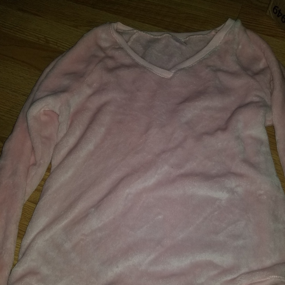 Soft microplush blush sweater.